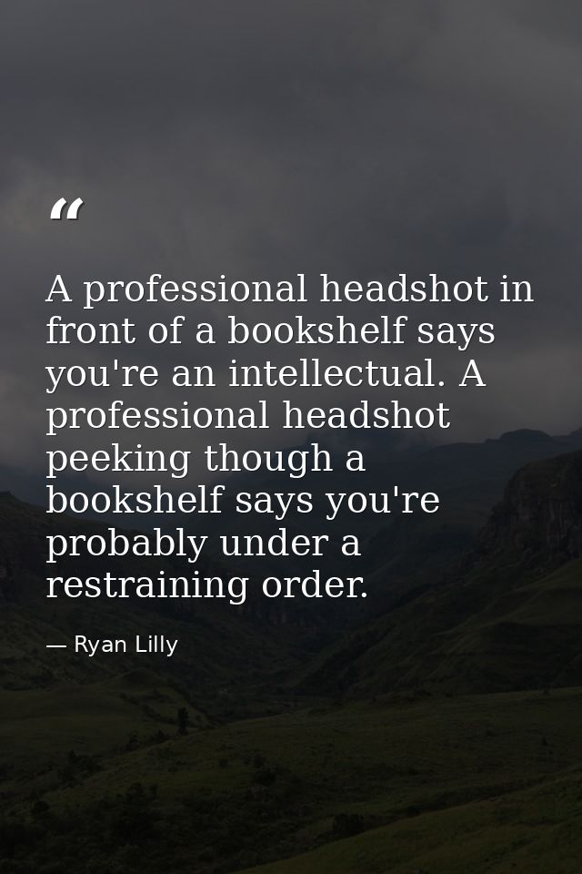 A professional headshot in front of a bookshelf says you're an intellectual. A professional headshot peeking though a bo — Ryan Lilly