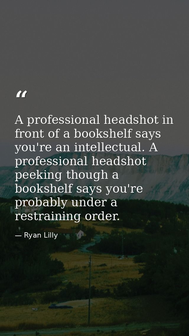 A professional headshot in front of a bookshelf says you're an intellectual. A professional headshot peeking though a bo — Ryan Lilly