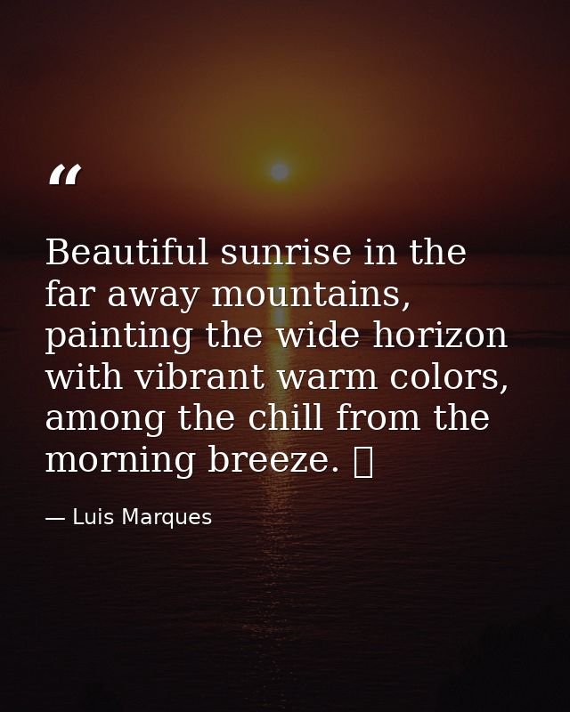 Beautiful sunrise in the far away mountains, painting the wide horizon with vibrant warm colors, among the chill from th — Luis Marques